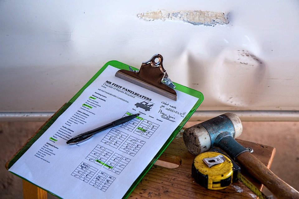 Insurance documents and policy paperwork on a desk