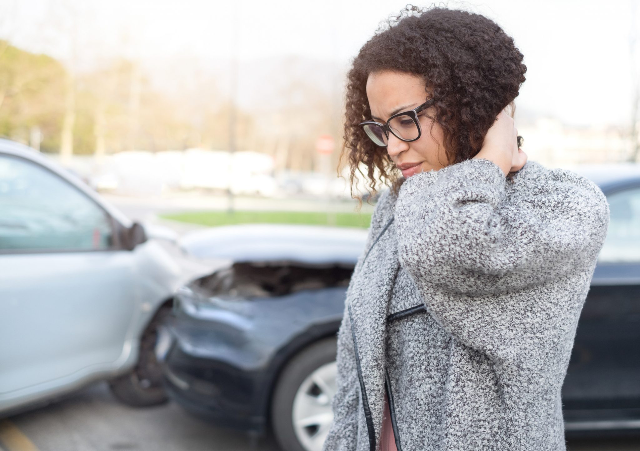 Person with neck pain after an auto accident